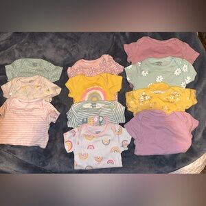 Sets of newborn onesies